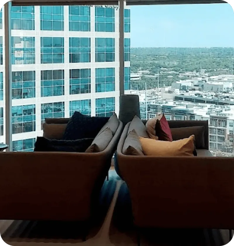 Lounge seating with a skyline view at a wellness center